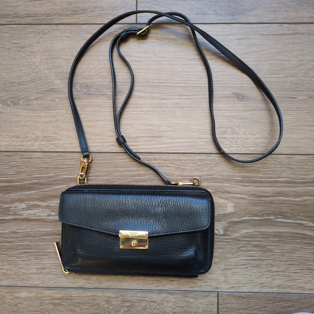 TUMI Larkin Stockton Phone Wallet Purse Black Leather Silver Crossbody Strap